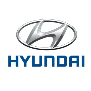 Hyundai logo with silver "H" in an oval above bold blue HYUNDAI text on a white background.